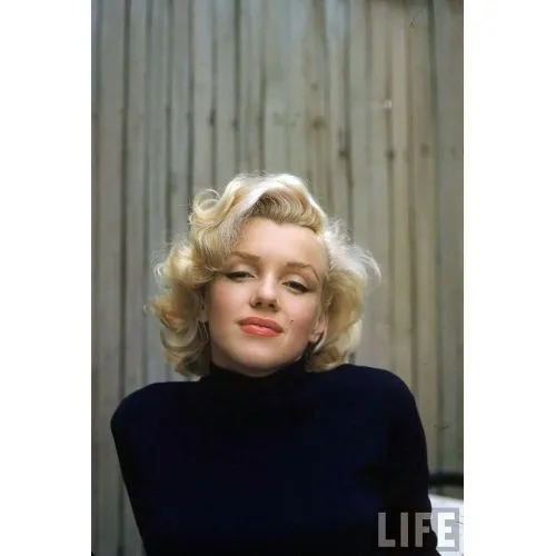 Marilyn Monroe Portrait 59 Marilyn Monroe Portrait 59 is a stunning black and white depiction of the iconic actress. The photo