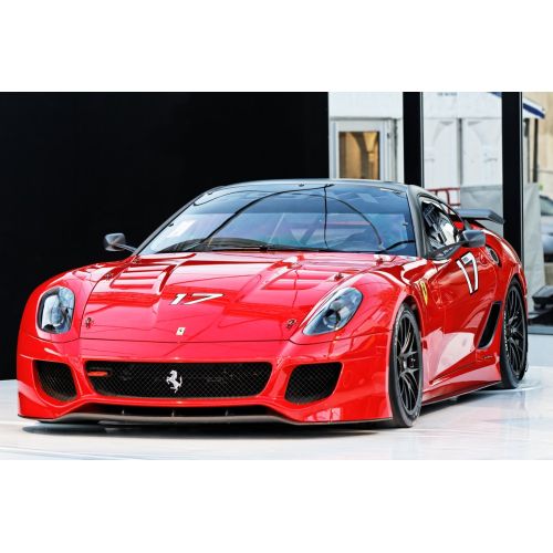 Ferrari 599 Car Poster The Ferrari 599 Car Poster features a high-resolution image of the iconic supercar. The poster is