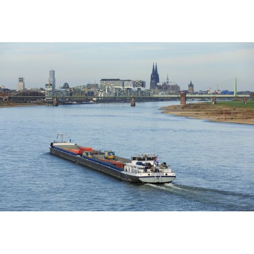 Cologne Germany Ship Poster The Cologne Germany Ship Poster features a stunning image of ships sailing along the Rhine River in