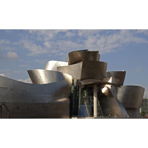 Guggenheim Poster The Guggenheim poster features a sleek and modern design showcasing the iconic architecture of the museum. It